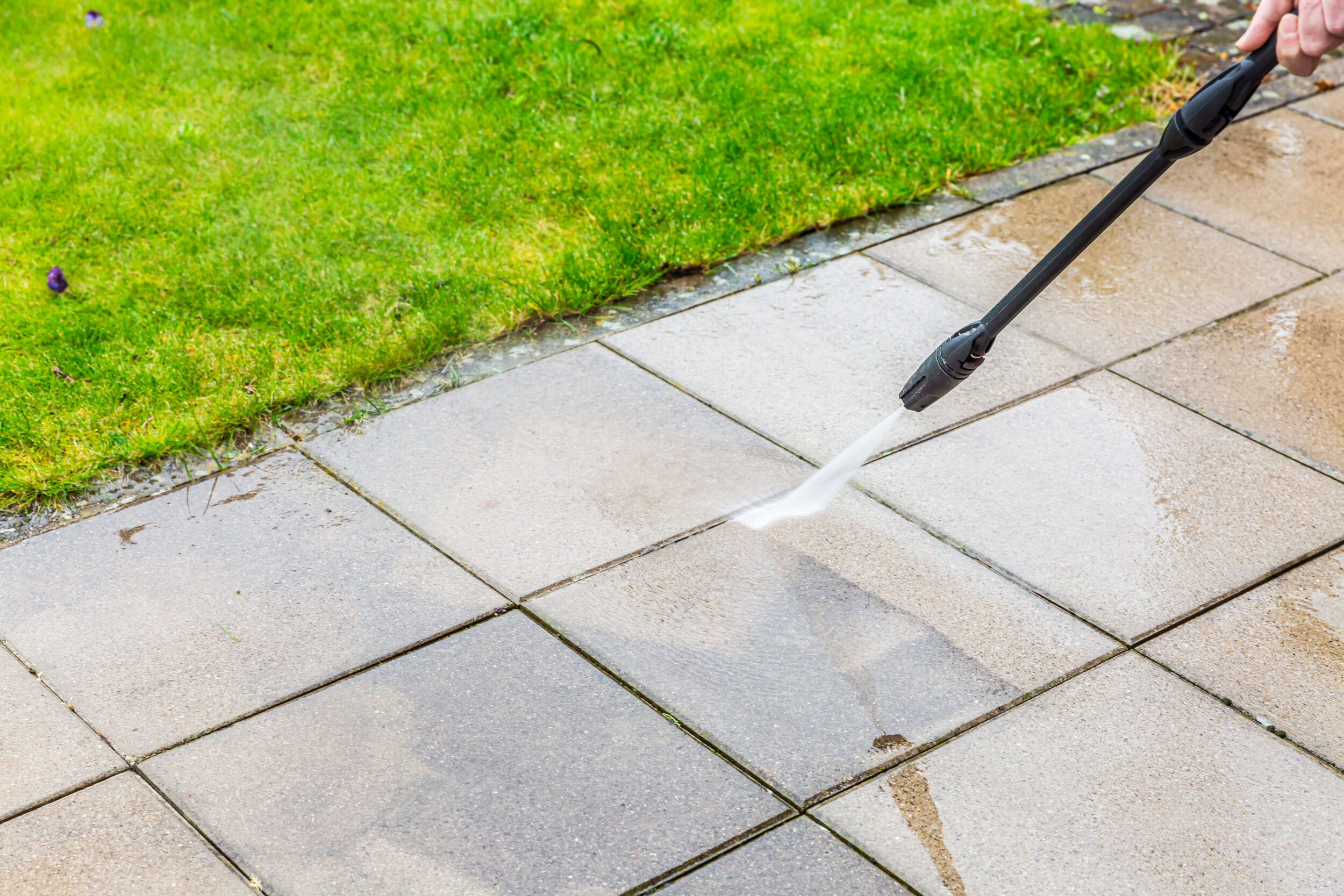 Detail Of Cleaning Terrace With High Pressure Water Blaster, Cleaning Dirty Paving Stones